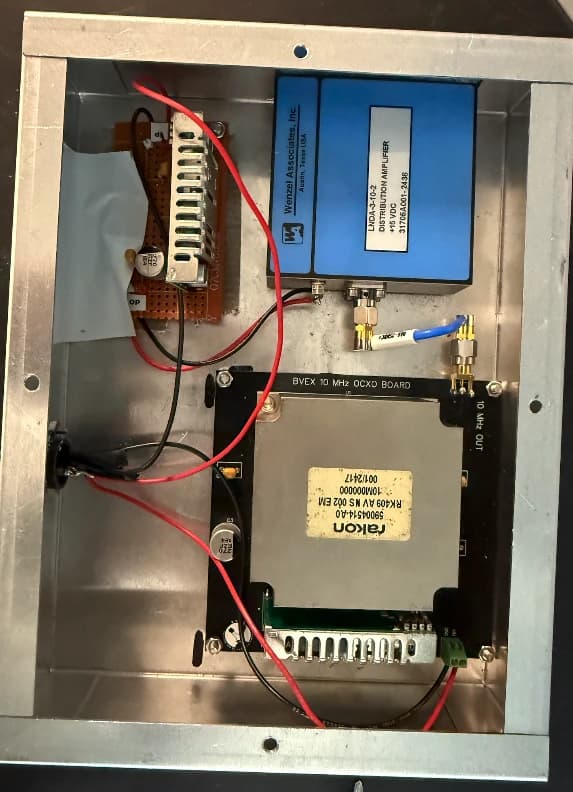 OCXO timing reference system with oven-controlled crystal oscillator